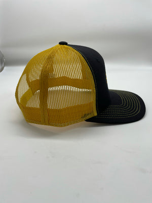 Black/yellow snap back trucker Junkiez logo hat. Pressure